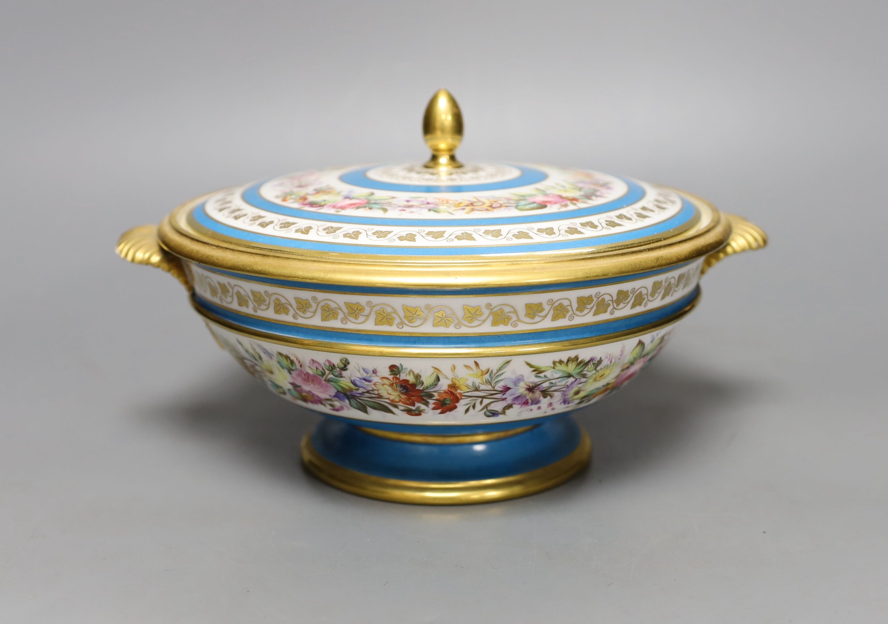 Sevres ecuelle and cover painted with a band of flowers surrounding the gilt monogram of Louis Phillipe, blue mark dated 1850, red mark for Chateau de Compiegne 25cm